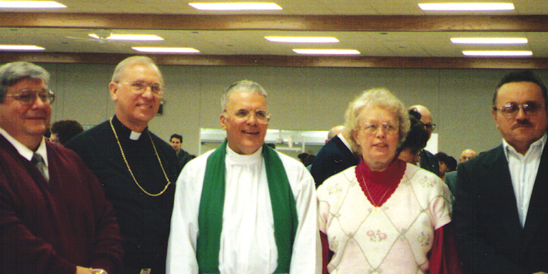 Father Robine with Bishop Adamec and Parishioners at Hall Dedication January 1993